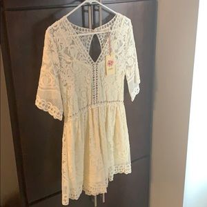 A beautiful cream lace romper
